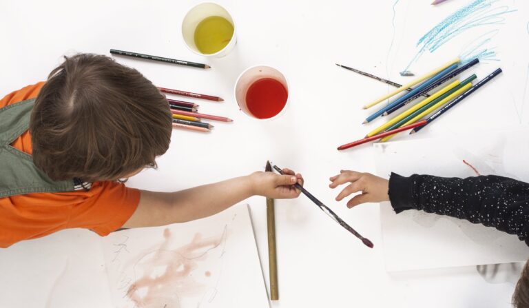 Two Young Children Sharing