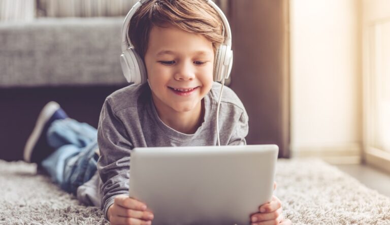 Little boy on tablet at home