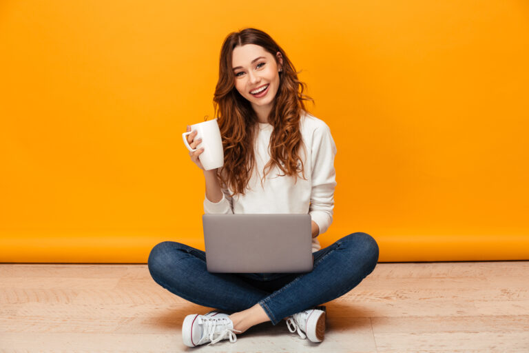 Smiling Young Lady at-PC