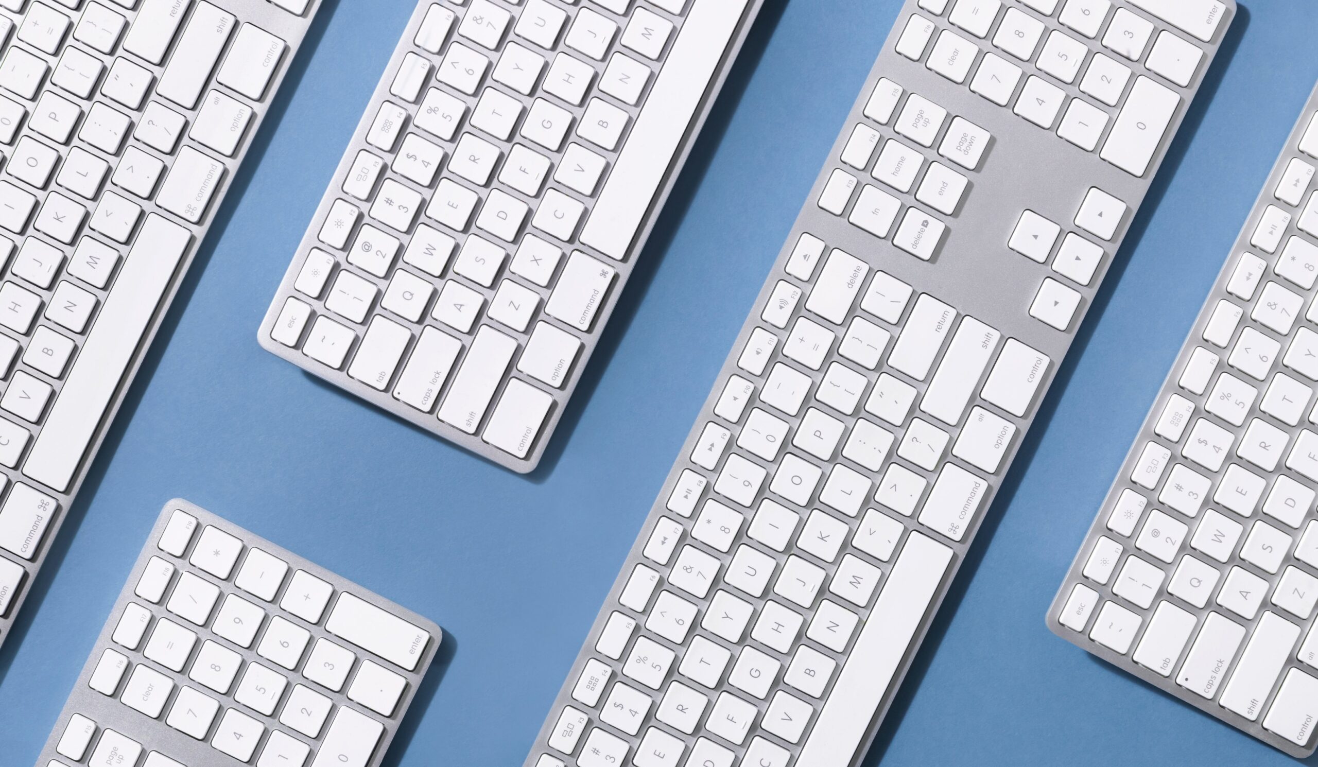 Keyboards on blue surface